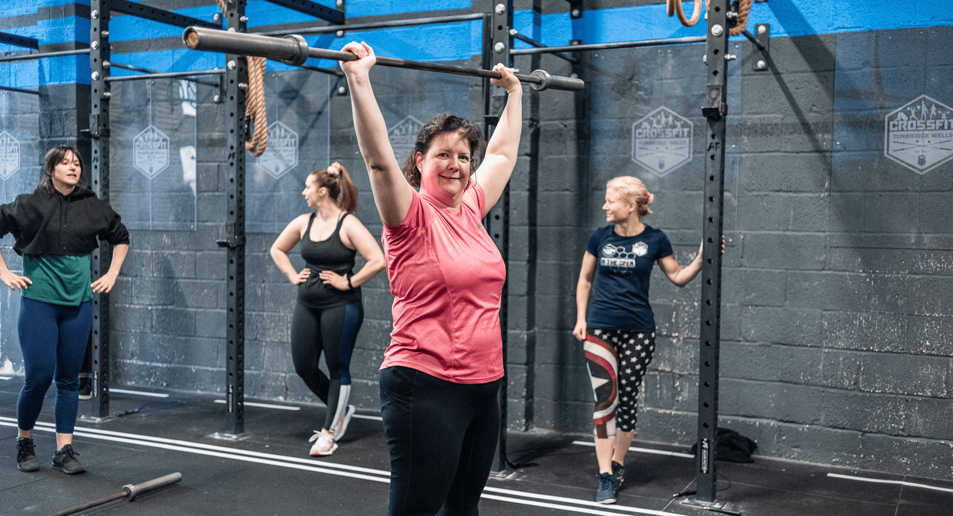 woman lifting weights at CrossFit Tunbridge Wells