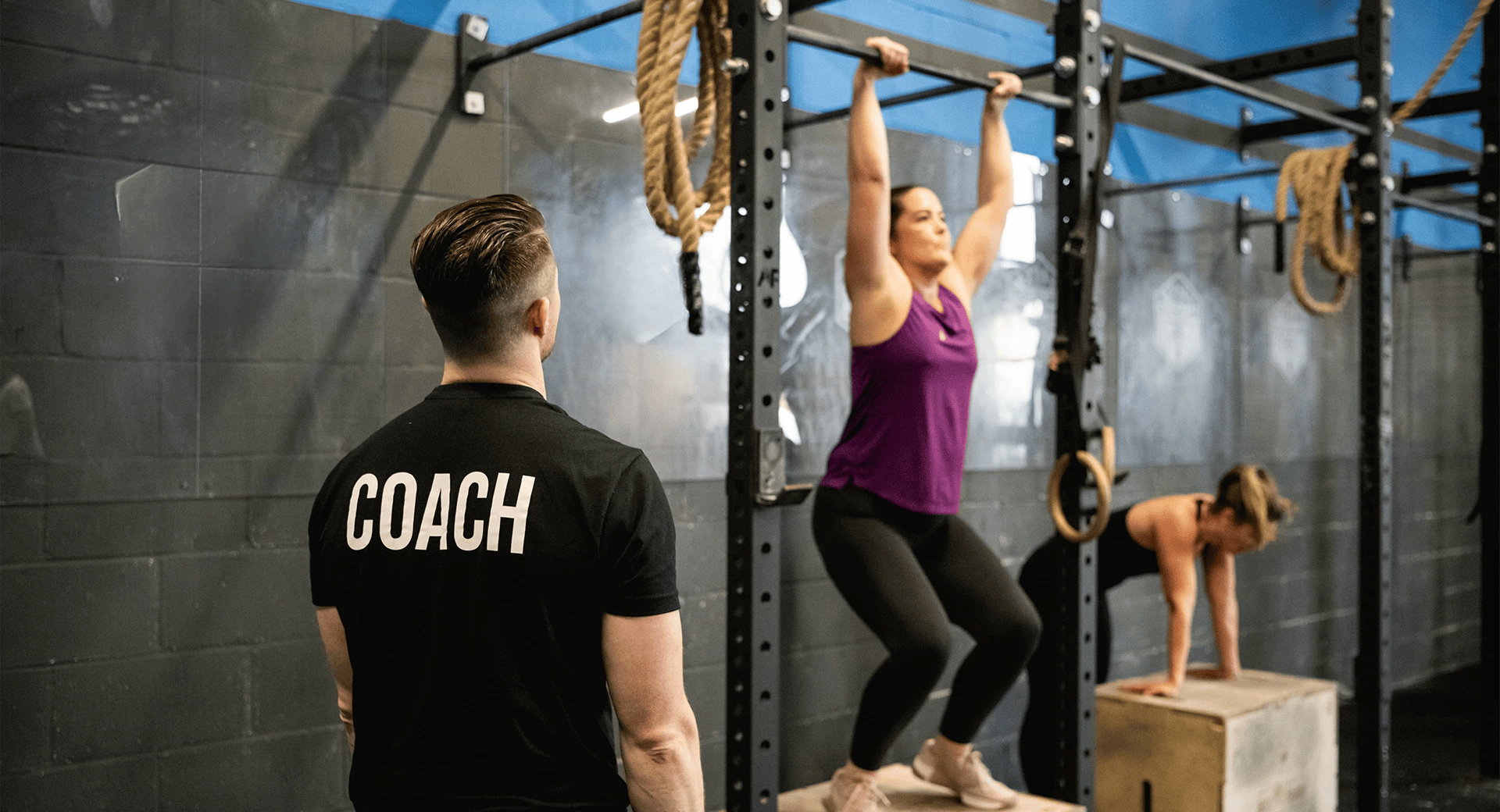 woman training with her coach at CrossFit Tunbridge Wells